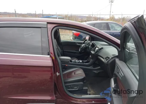 2020 Ford Edge Titanium z USA, uszkodzony, nr VIN 2FMPK4K91LBA84243